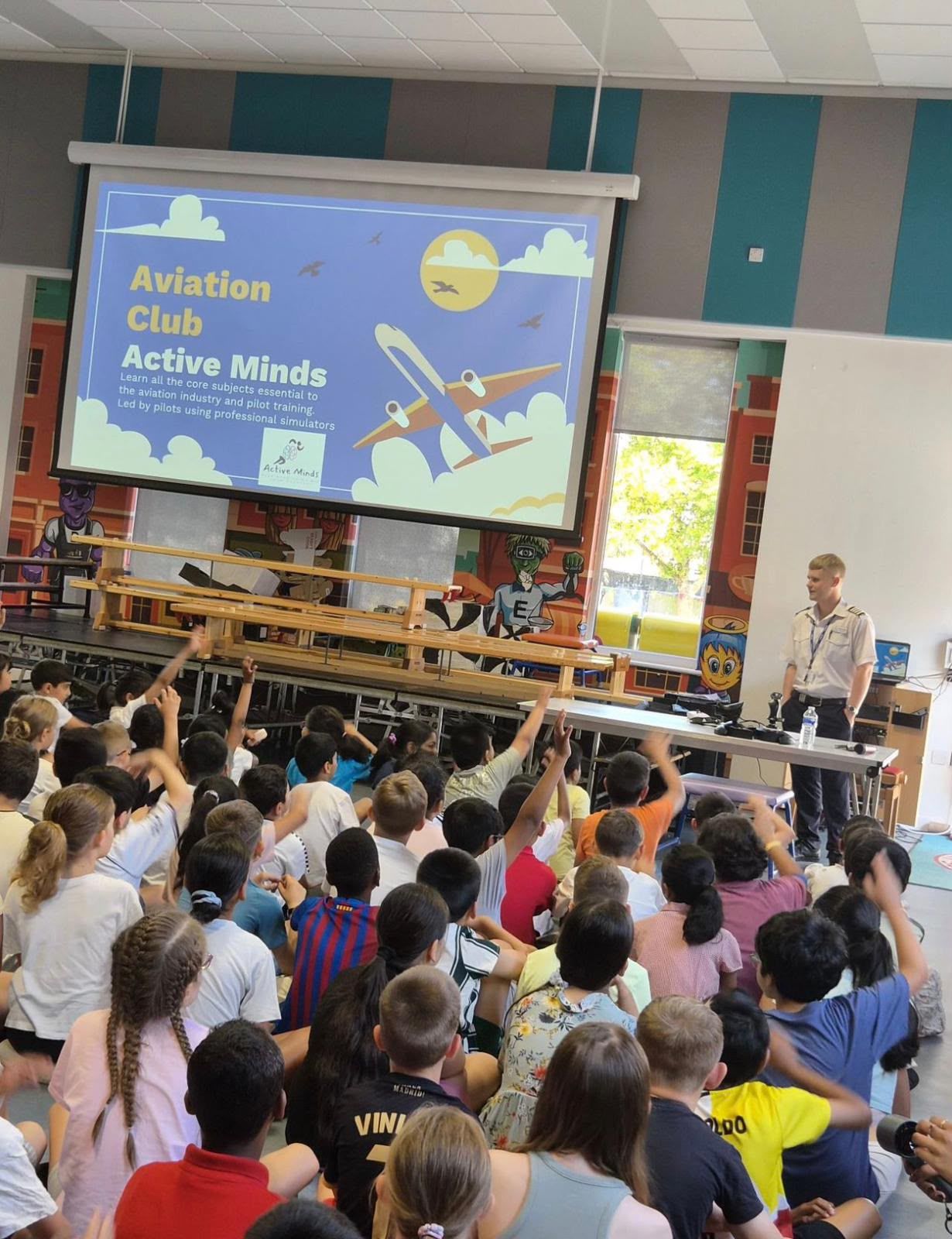 Children enjoying aviation assembly at Active Minds