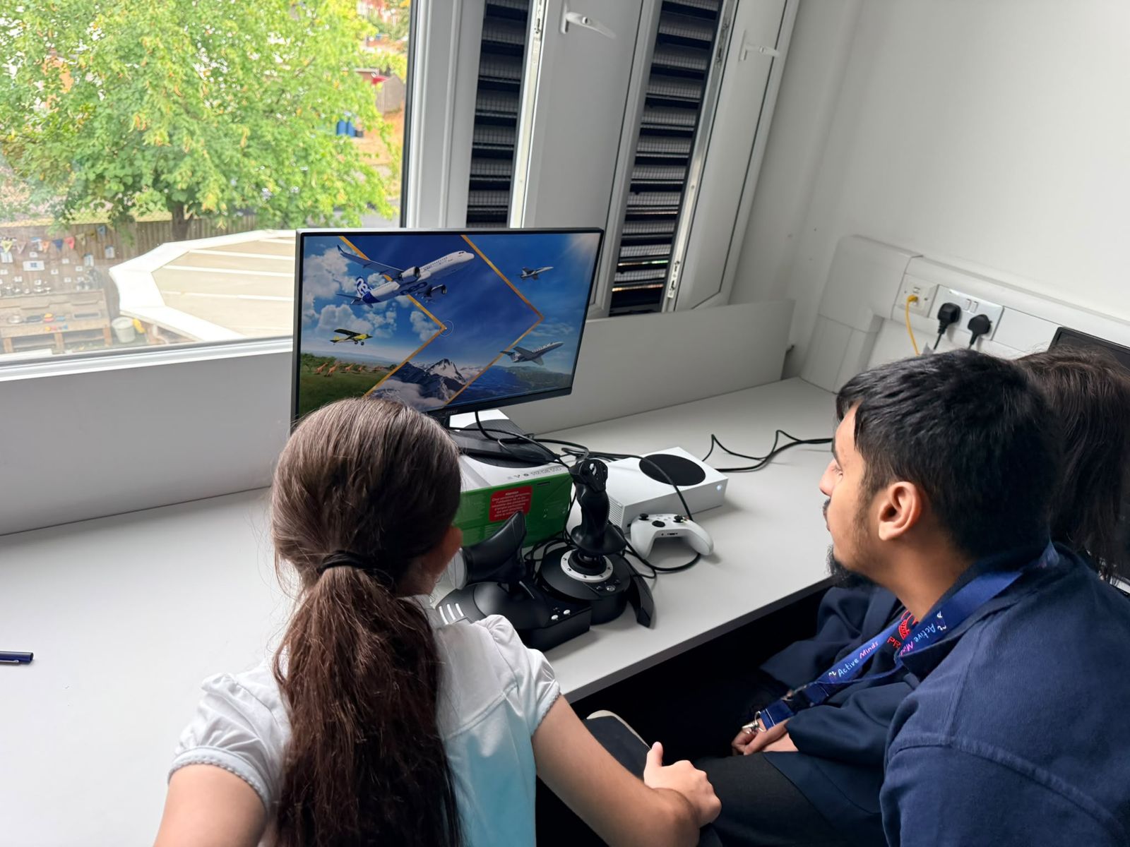 Girl flying on a simulator