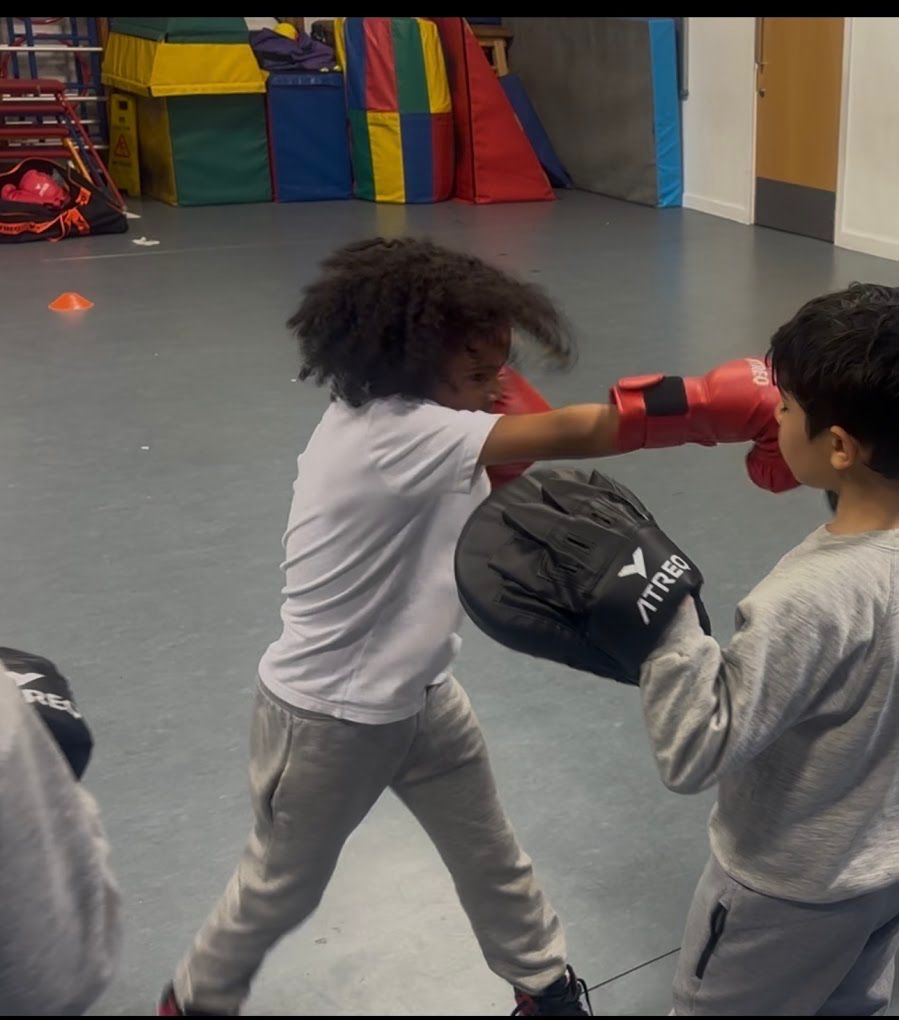 Children enjoying boxing at Active Minds