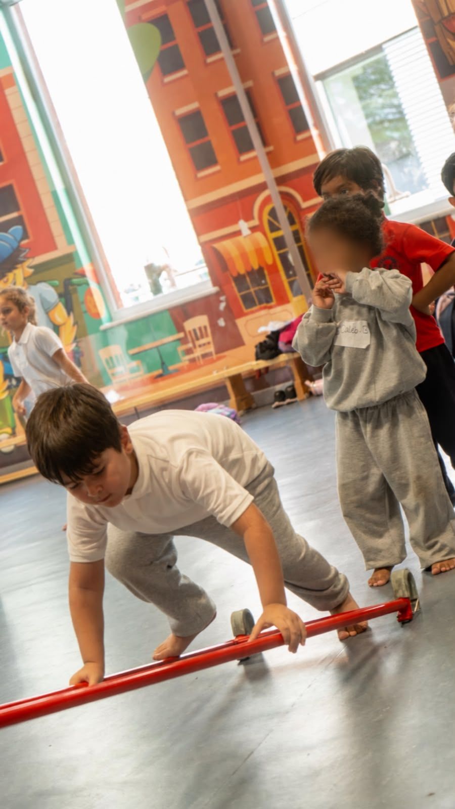 Child on a gymnastics bar