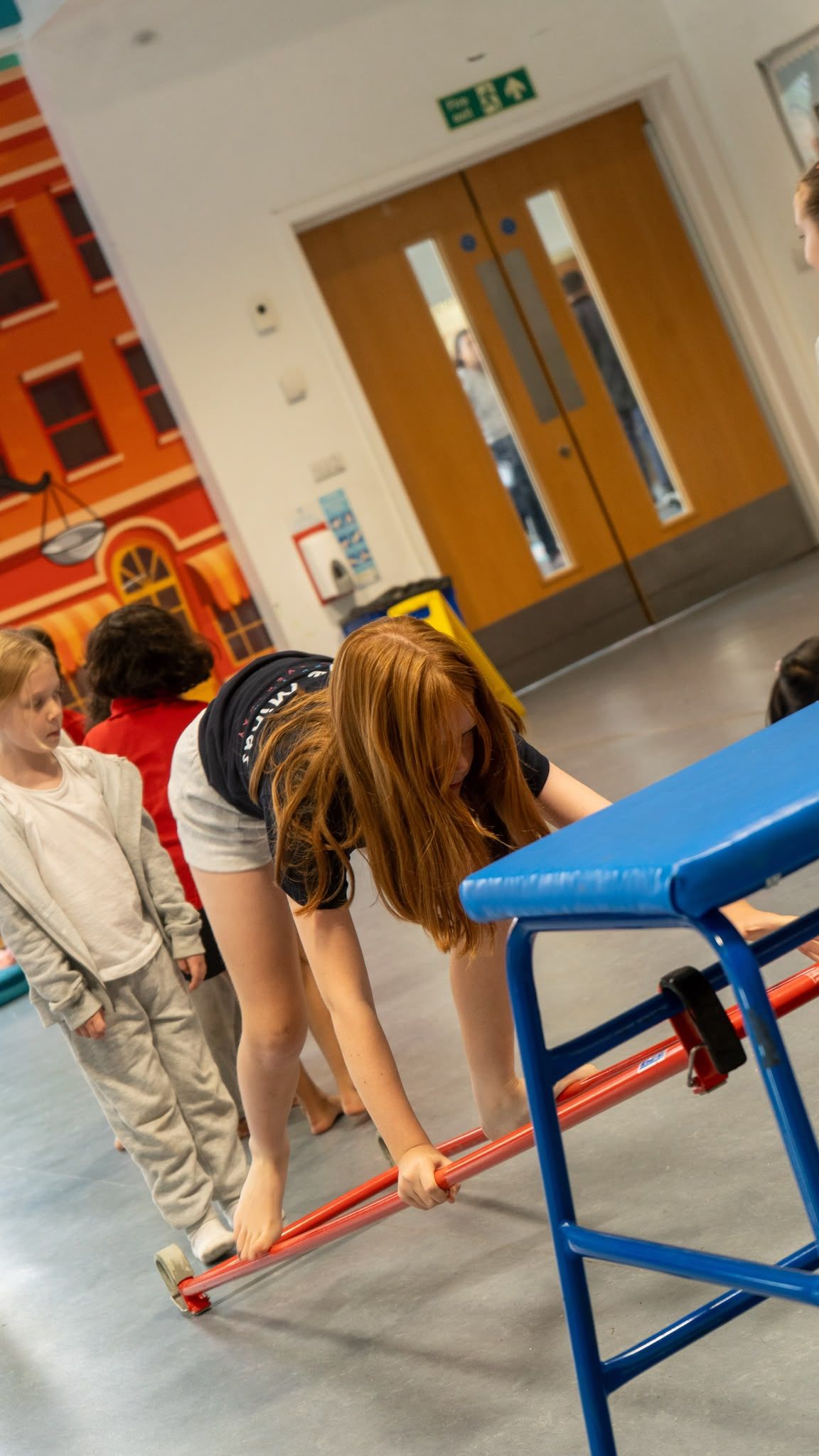 Children enjoying gymnastics vault at Active Minds