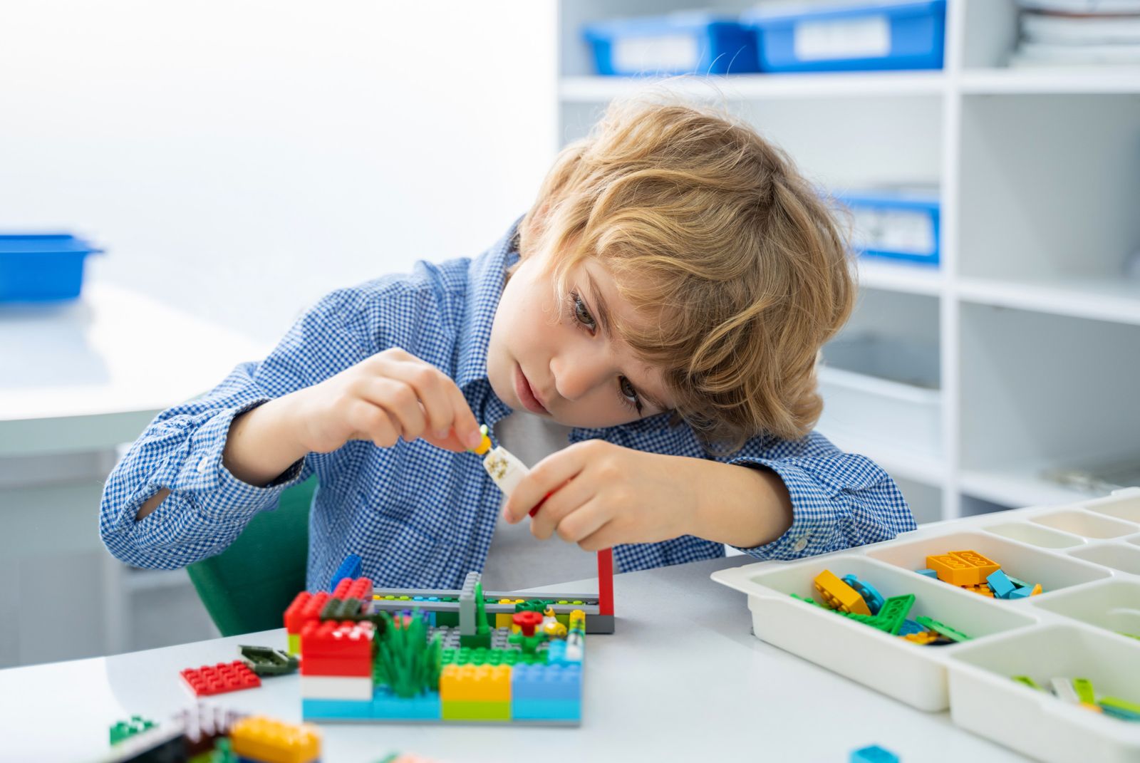 Children enjoying lego building at Active Minds