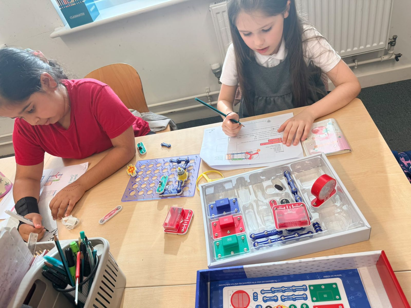Children building circuits in STEM club